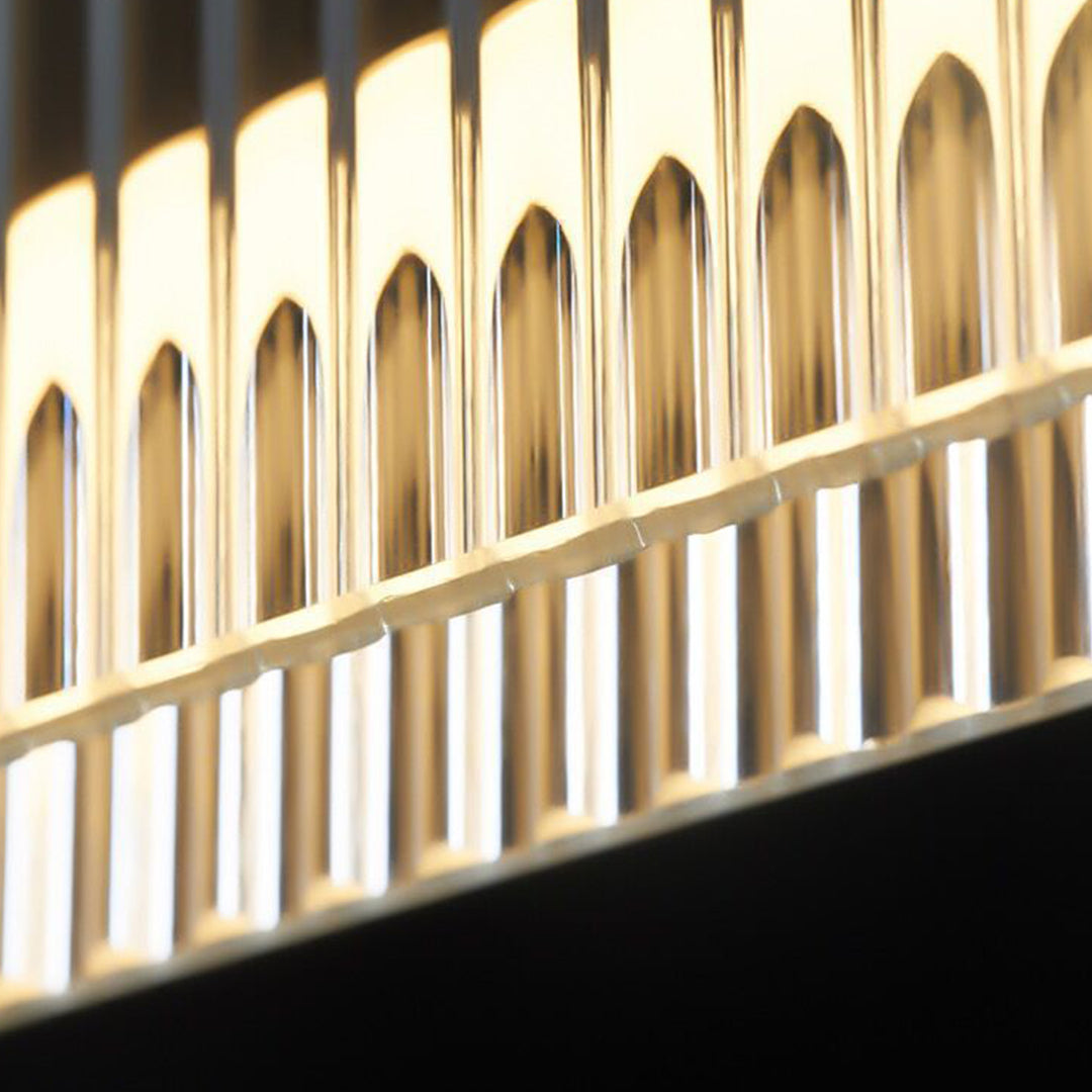 Architectural black round pendant light creating dramatic lighting effect in commercial interior