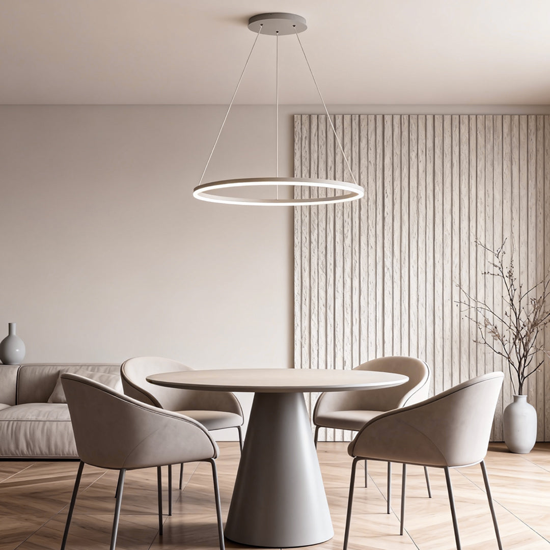 Black LED ring chandelier suspended above a dining area with soft neutral decor.